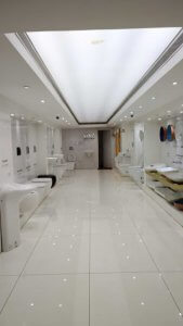 Inside of ABC Emporio Kannur one of the Best Sanitary Ware Showroom in Kerala  dedicated area of Water Closets in a white background